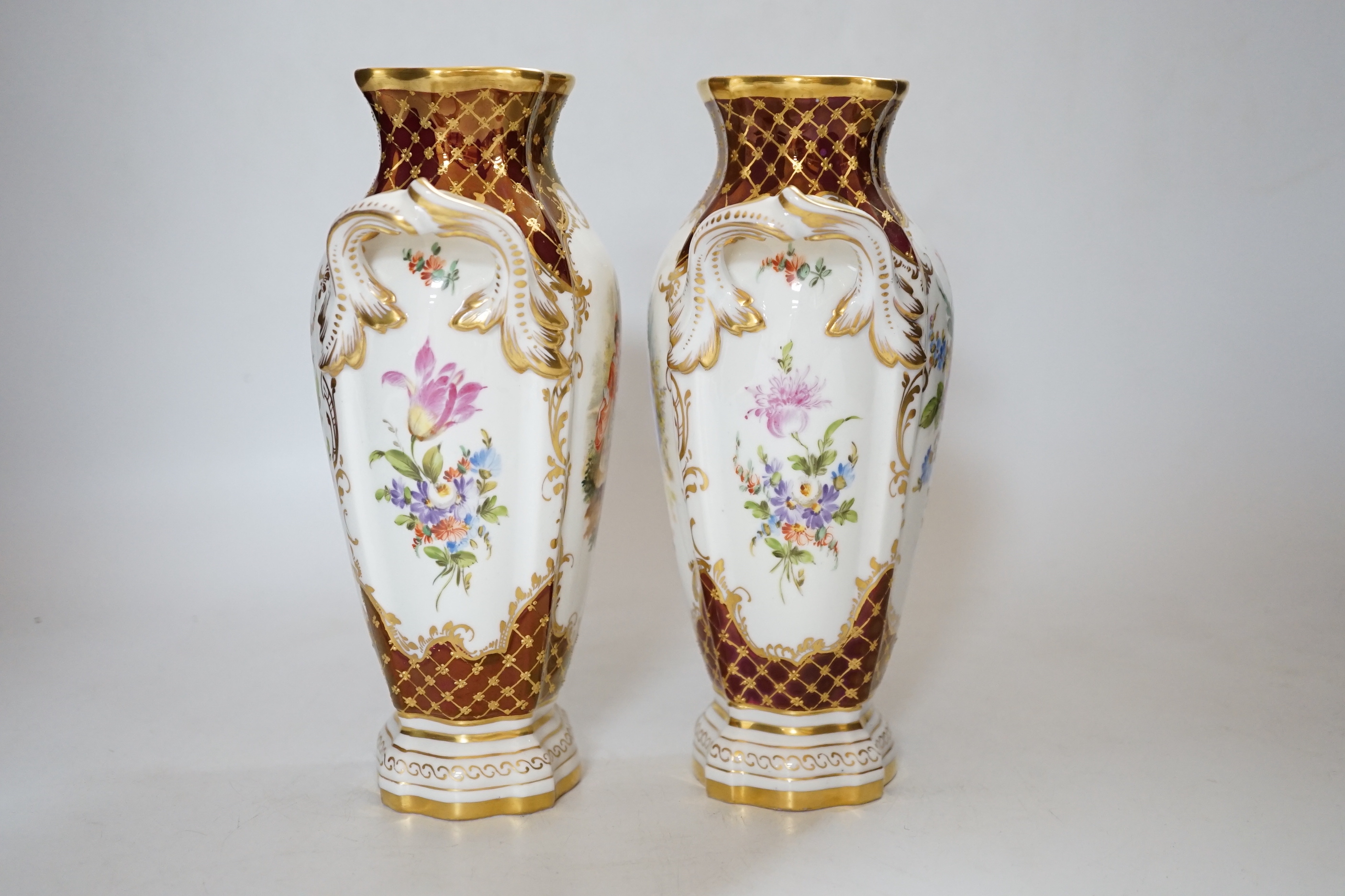 A pair of Potschappel porcelain vases, 20cm